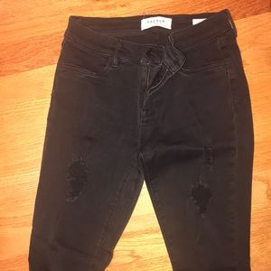 Black distressed jeggings